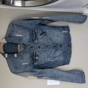 Distressed denim jacket